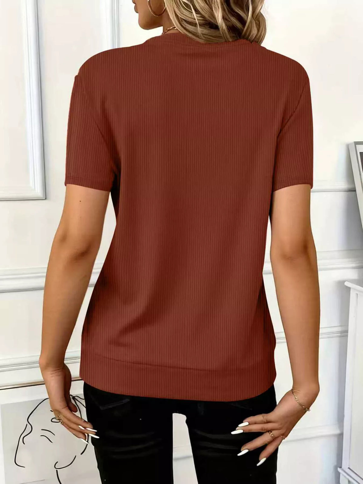 Women's ribbed half zip short sleeve casual top by Plush Fashion Hub, featuring a fitted design and soft fabric in neutral tones.