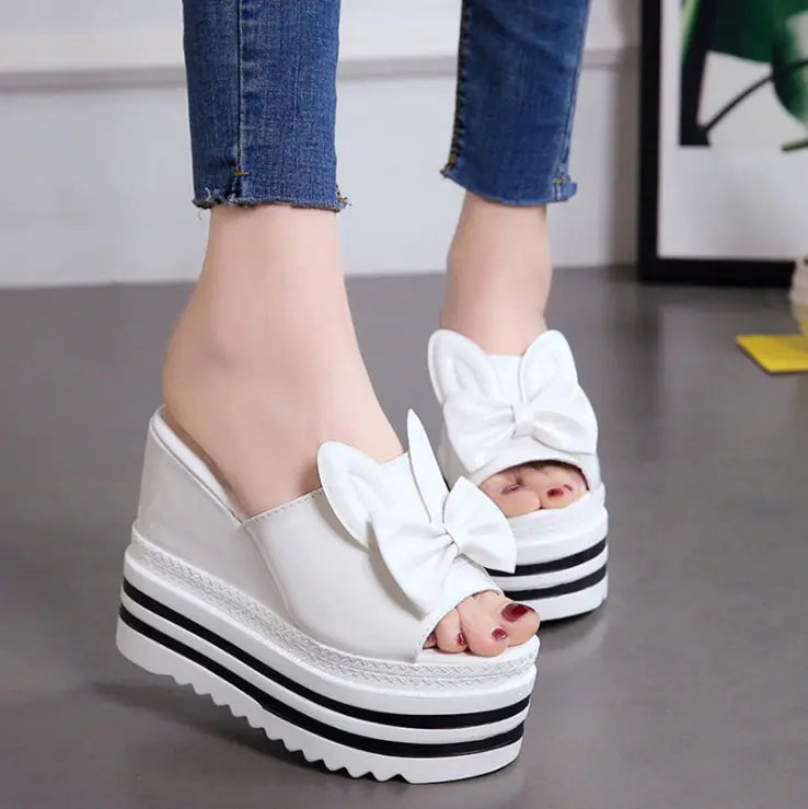 Women's wedge high heel waterproof platform sandals with ankle straps and open toe design, stylish and comfortable for summer wear.