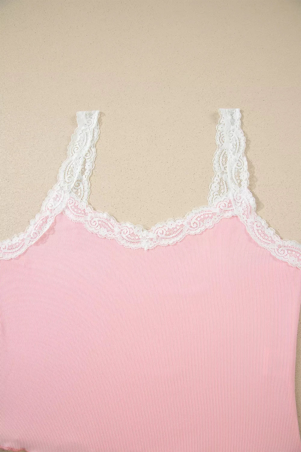 Ribbed knit lace straps patchwork cropped top with floral pattern and lettuce hem, part of a trendy lounge set.