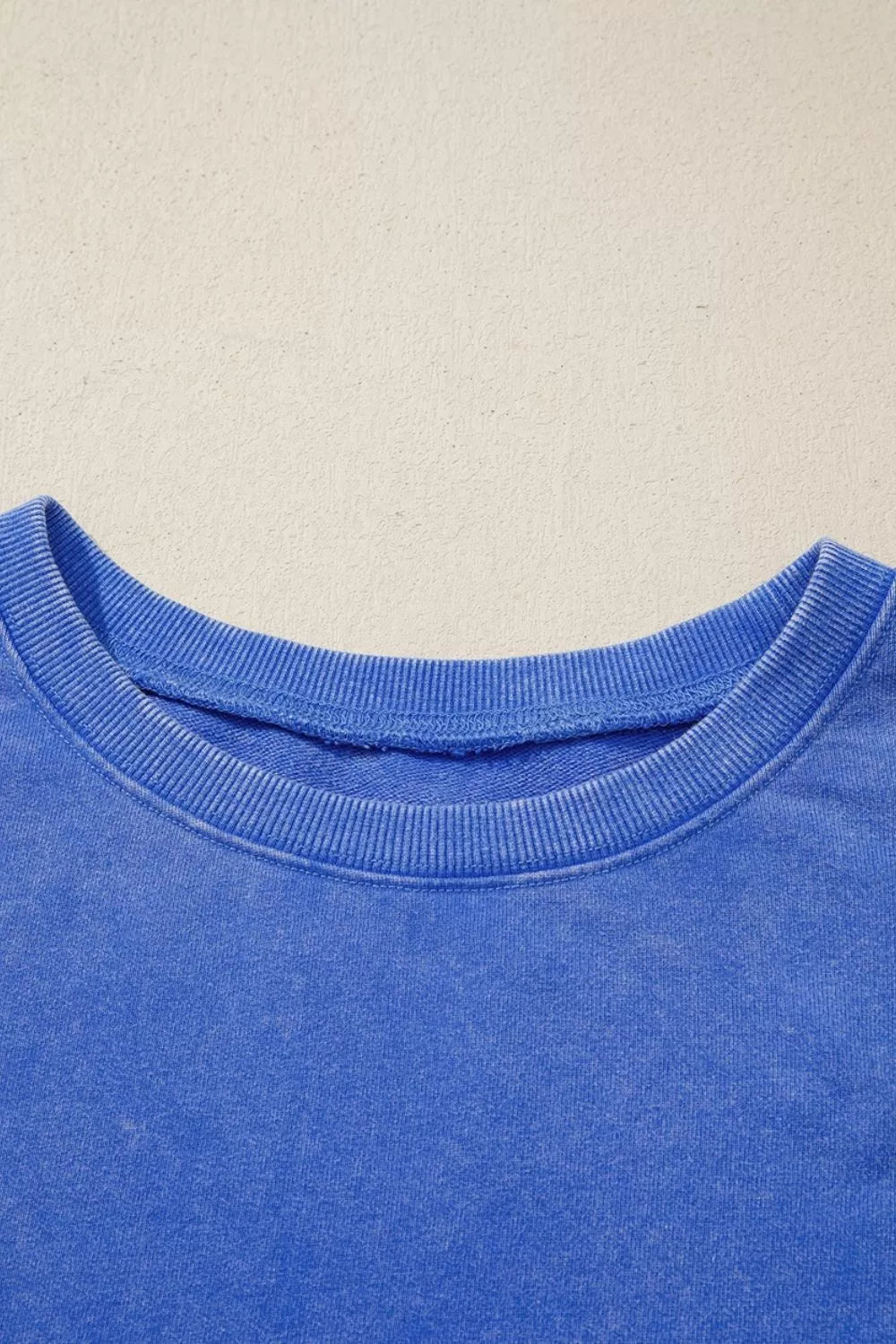 Mineral Wash Split Hem Loose Tunic Sweatshirt by Trendsi, soft sweater with relaxed fit and stylish split hem detail.