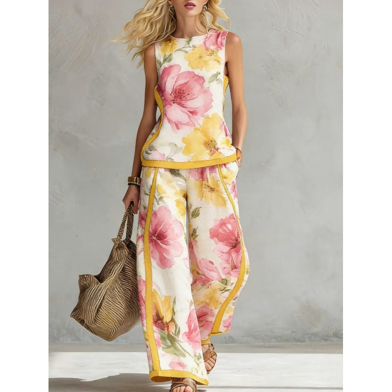 Printed retro sleeveless top and wide-leg pants set by FitiqueFit, featuring vibrant patterns in a stylish two-piece design.