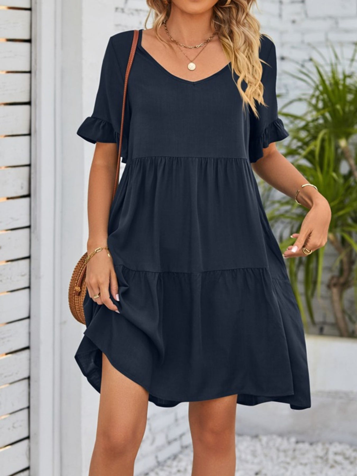 Lightweight rayon ruffled sleeve tiered mini dress with pockets by Plush Fashion Hub, featuring a stylish and breezy design.