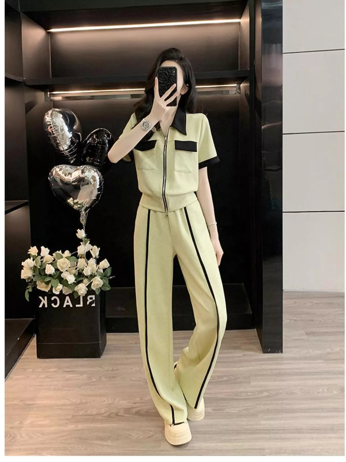 Plush Fashion Hub contrast zip-up top and wide-leg pants set, two-piece casual outfit with color-block design and comfortable fit.