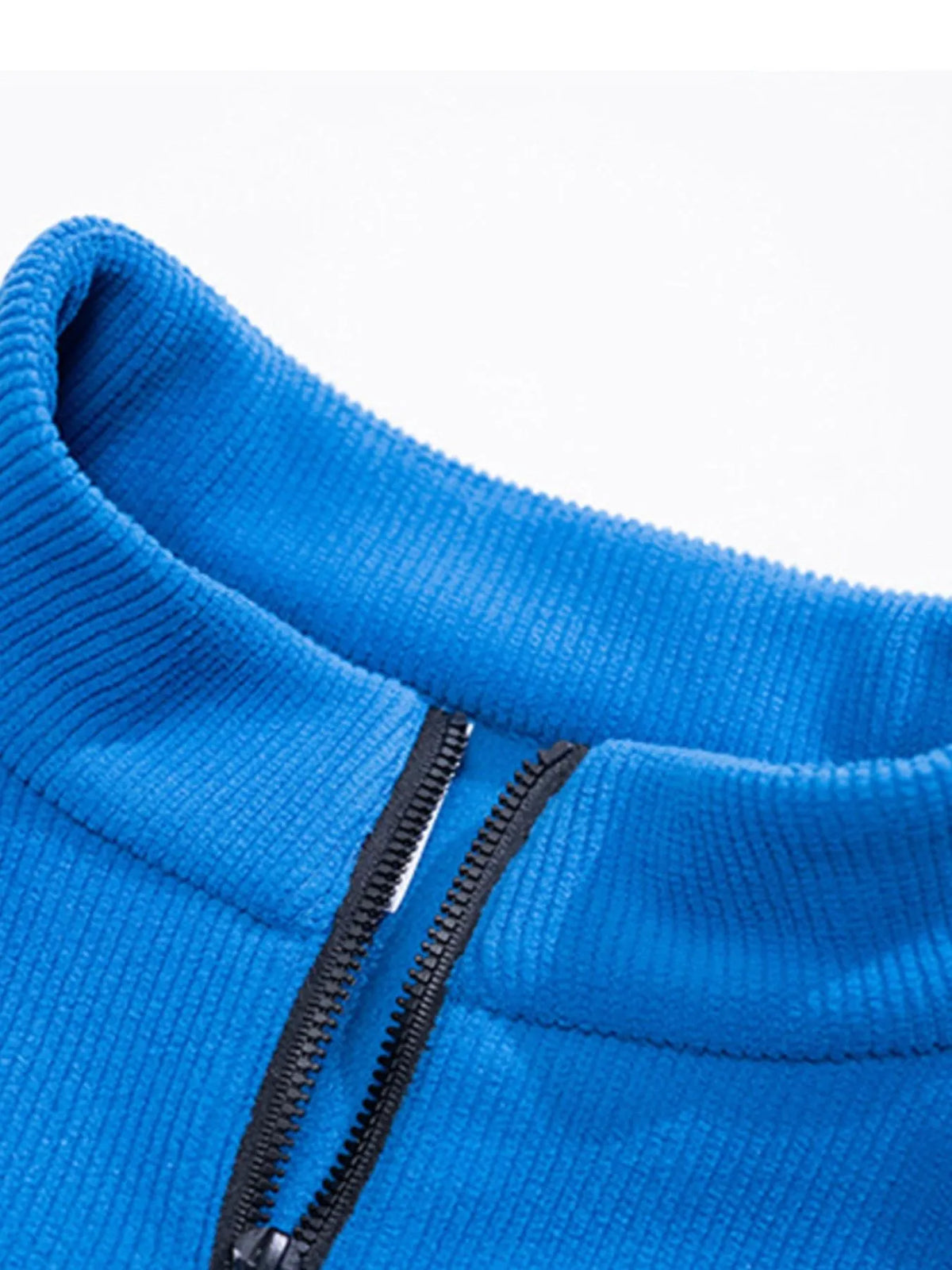 Plus size men's fleece sweatshirt with half-zip and chest pocket, featuring a cozy, casual design from Trendsi.