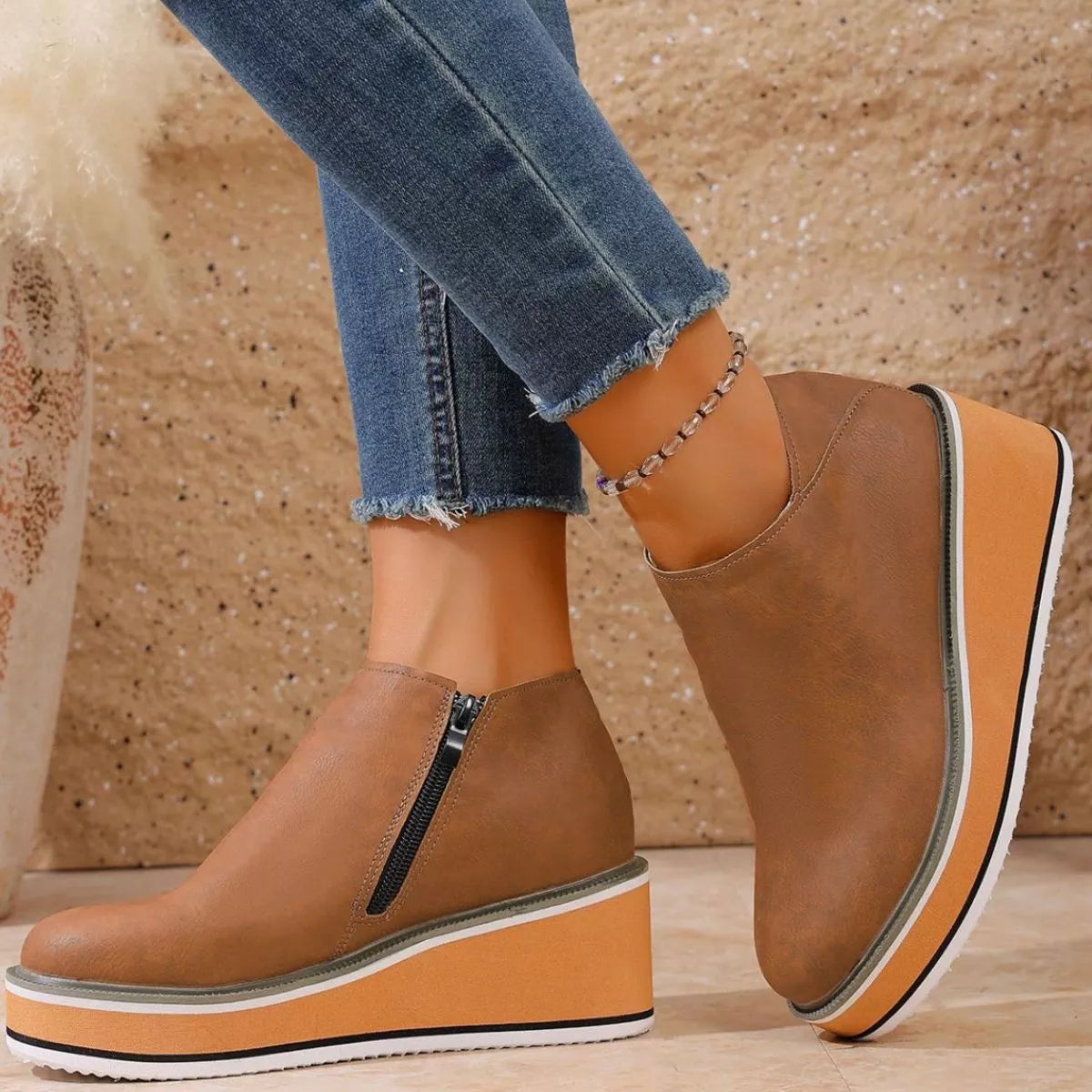 Women's round toe wedge ankle boots by Trendsi, stylish and comfortable women's shoes with a trendy design and ankle height.