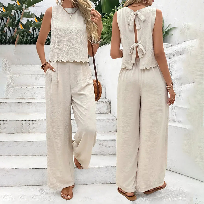 Elegant FitiqueFit casualwear set featuring a sleeveless crop top and wide-leg pants, perfect for relaxed, stylish outfits.