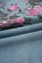 Esme Floral Print Bootcut Jeans by Threaded Pear featuring a floral pattern and classic bootcut fit on a model.