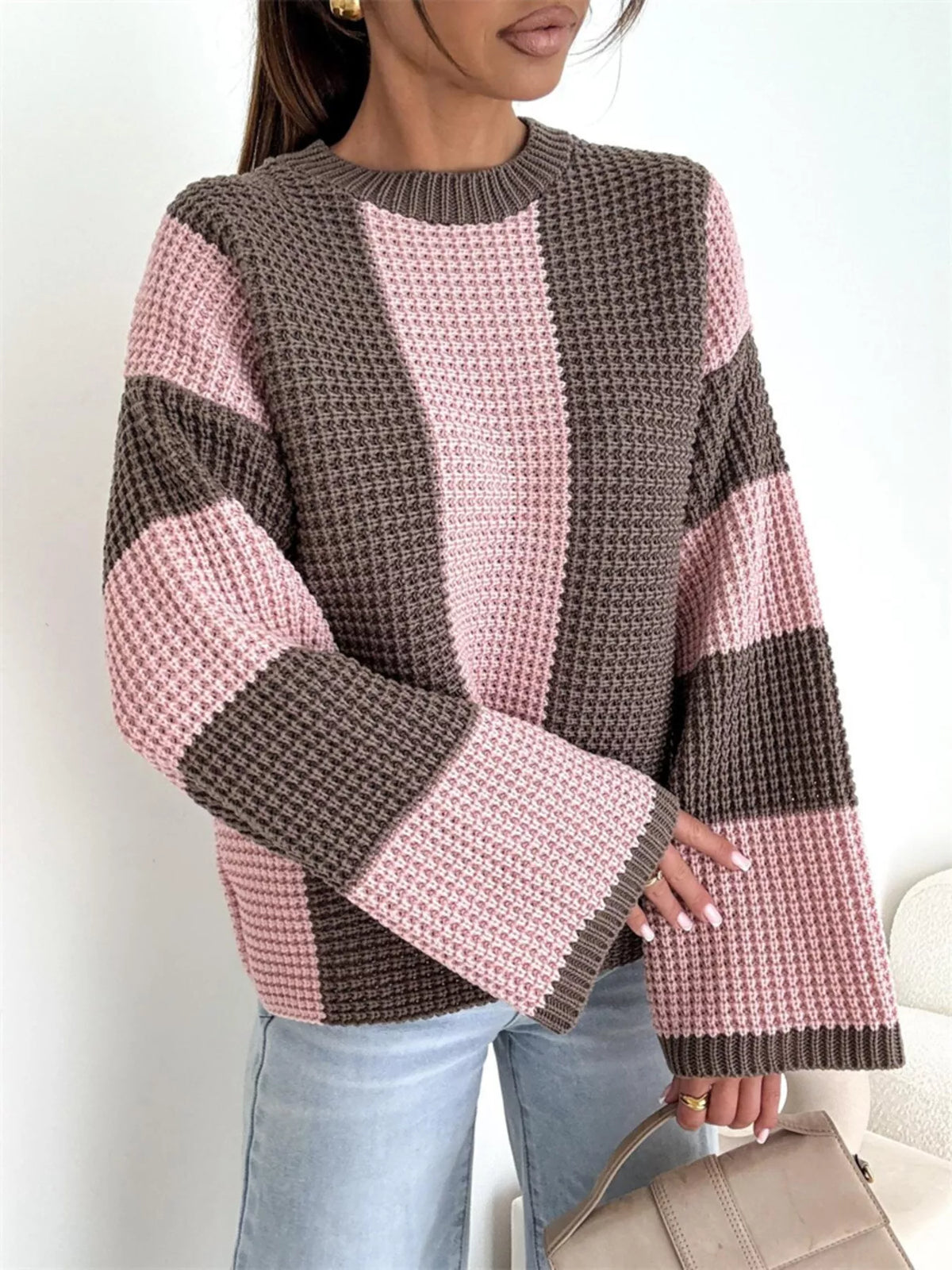 Color block long sleeve sweater by Trendsi featuring a cozy knit design in vibrant color blocks, perfect for casual wear.
