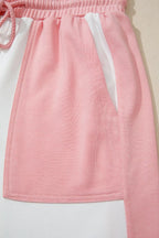 Two-tone color block patchwork tee and drawstring loose pant set by Trendsi, casual stylish outfit with matching top and bottoms.