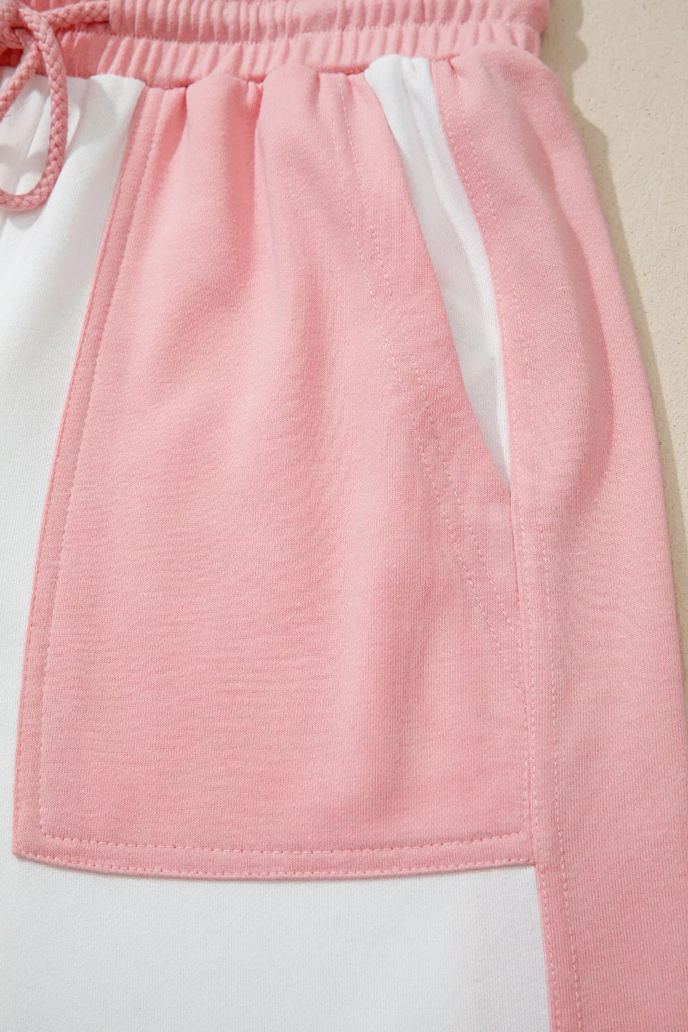 Two-tone color block patchwork loungewear set with loose drawstring pants and matching tee by Plush Fashion Hub