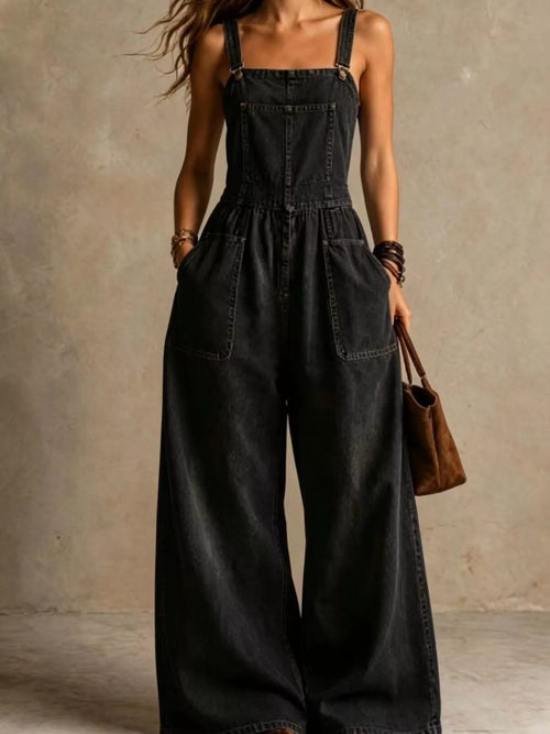Full size wide leg denim jumpsuit with adjustable straps and pockets, designed by Trendsi, shown in a full-length view.