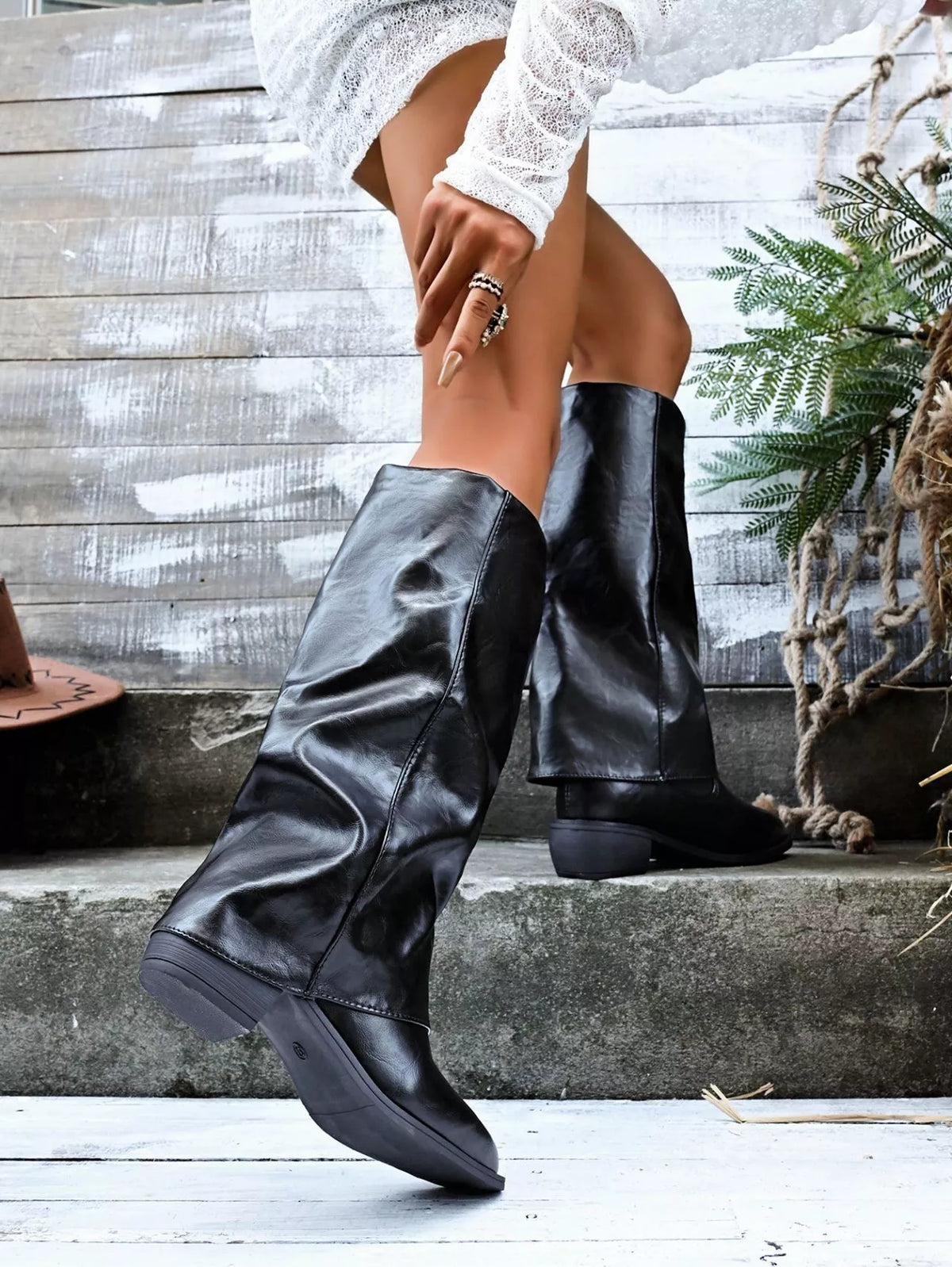 Point toe block heel boots from Trendsi, stylish footwear with sleek design and comfortable block heel silhouette.
