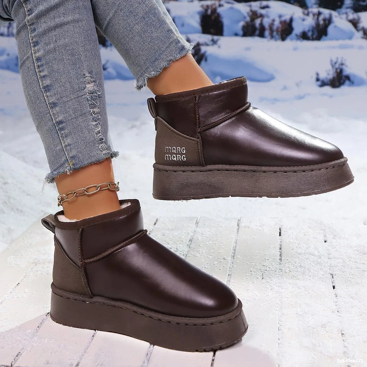 Faux-fur platform ankle boots by Trendsi featuring a stylish design with a chunky sole and cozy fur lining.