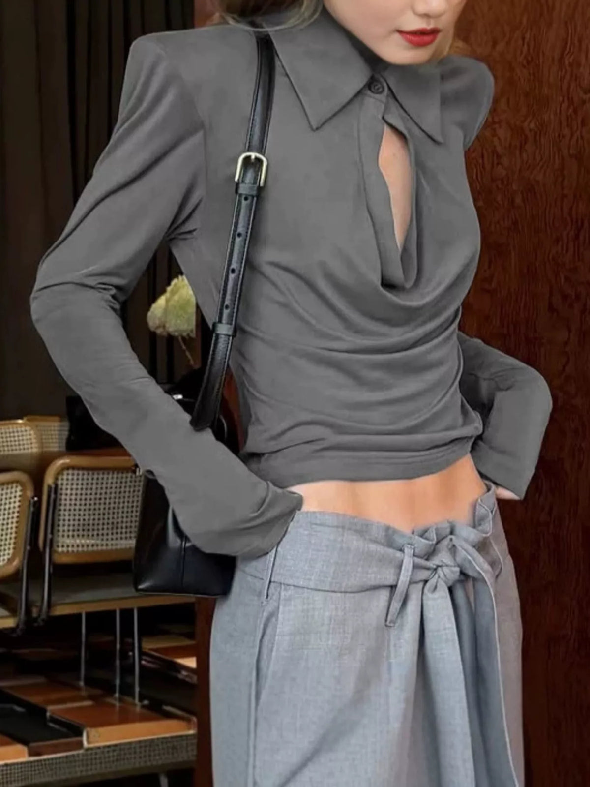 Slim-fit long-sleeve T-shirt with cutout detail from Trendsi, featuring a stylish and modern design.