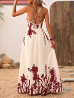 Deep V-neck spaghetti strap evening maxi dress by Trendsi featuring an elegant floor-length gown in flowing fabric.