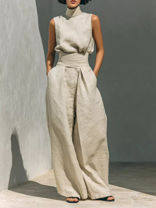 Plus size sleeveless wide-leg jumpsuit with smocked waist by Trendsi, shown in full length on a model.
