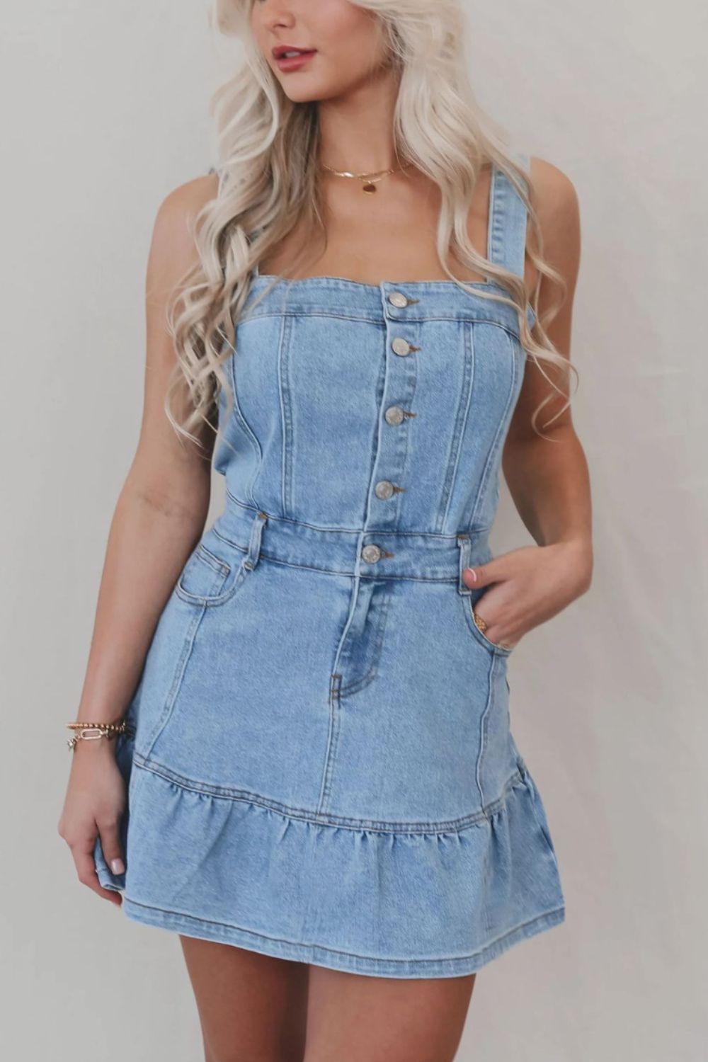 Denim dress with ruffled hem and button front, square neckline, from Plush Fashion Hub, stylish and casual clothing for women.