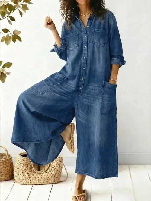 Full size button-front wide leg jumpsuit with chest pockets in plus size, featuring a stylish and comfortable fit from Trendsi.