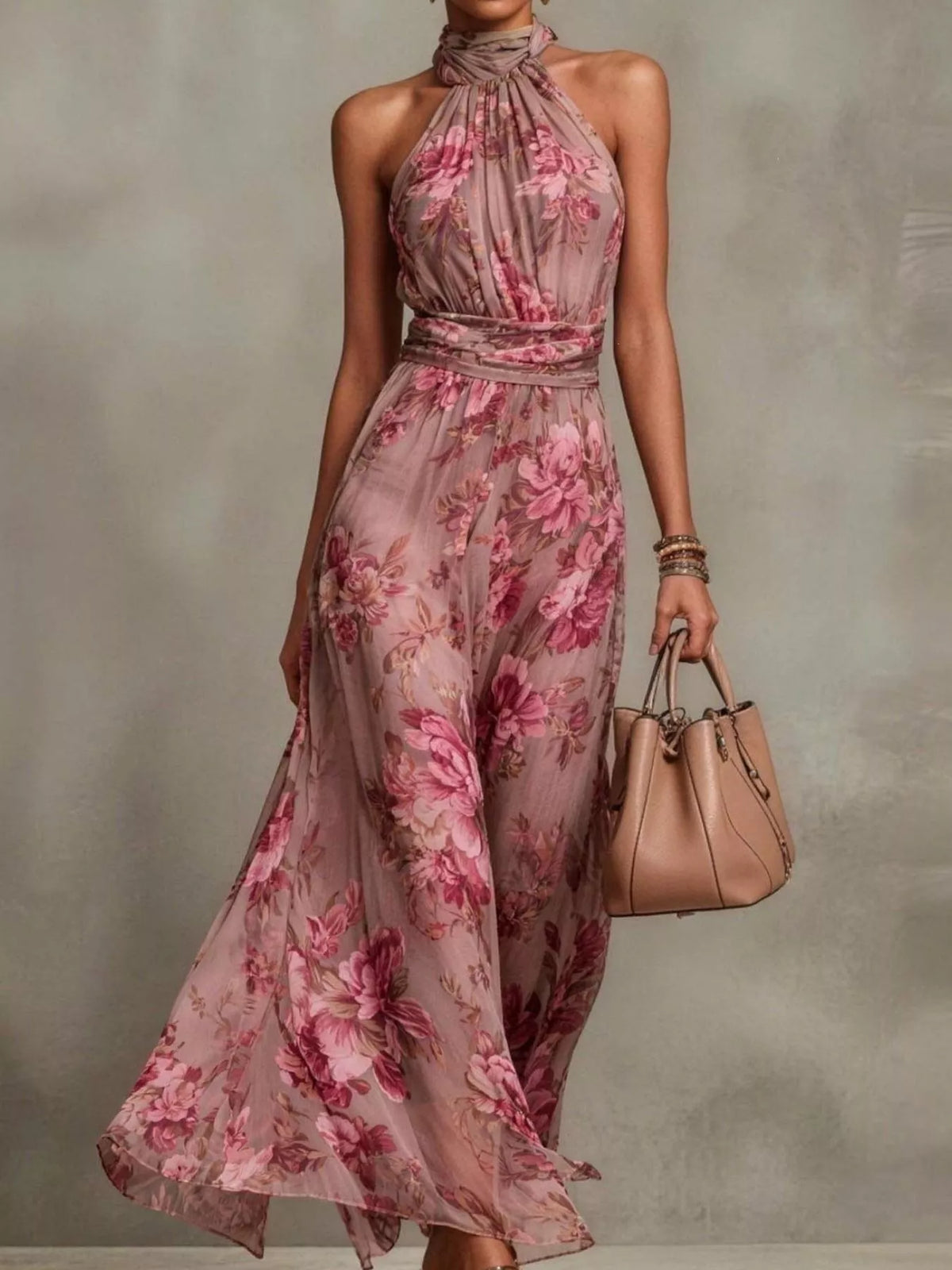 Plus size floral print sleeveless maxi dress by Trendsi featuring a flowing silhouette and vibrant flower pattern.