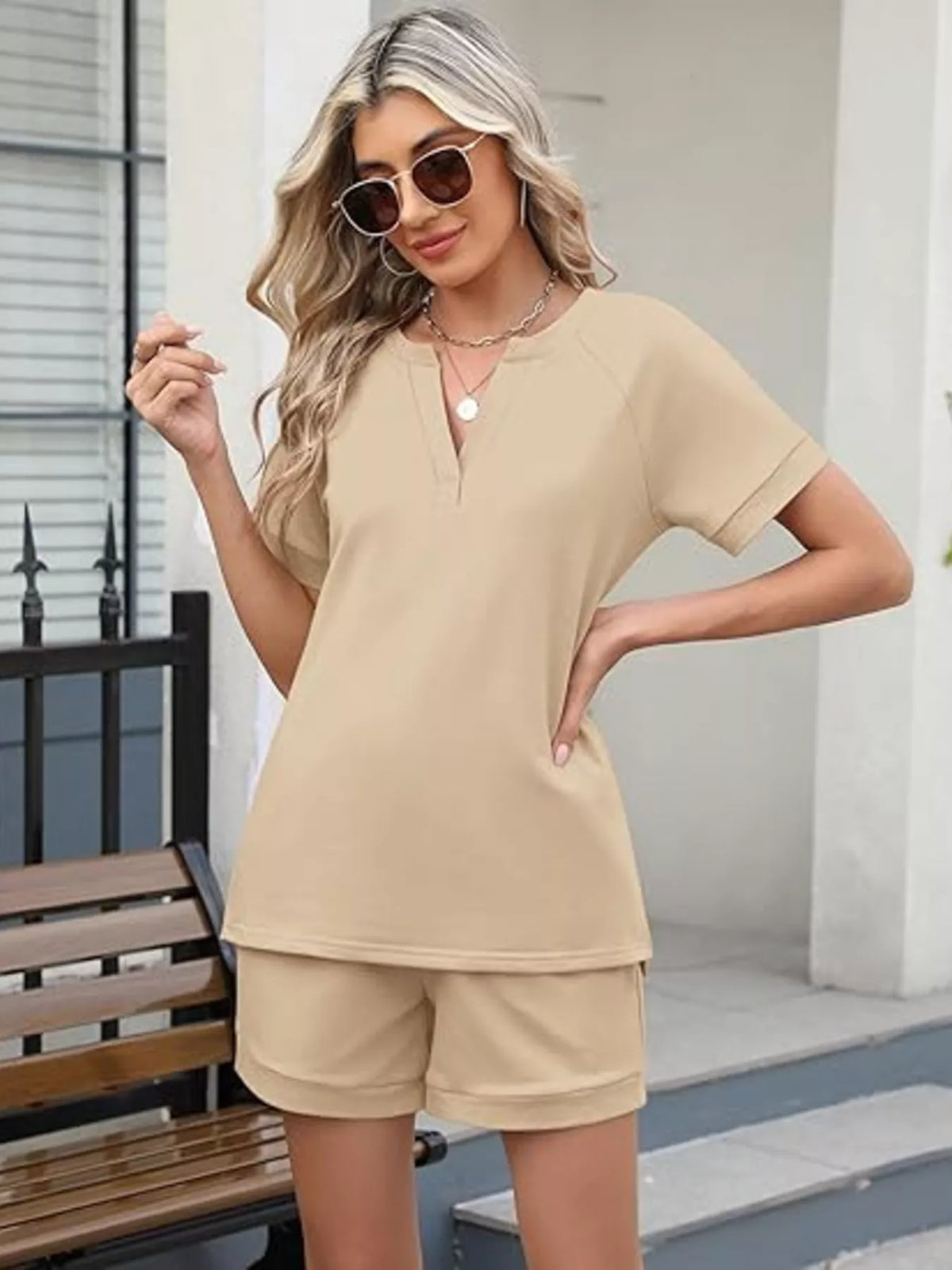 Plush Fashion Hub solid color short sleeve top and shorts two-piece set, casual summer apparel for women.