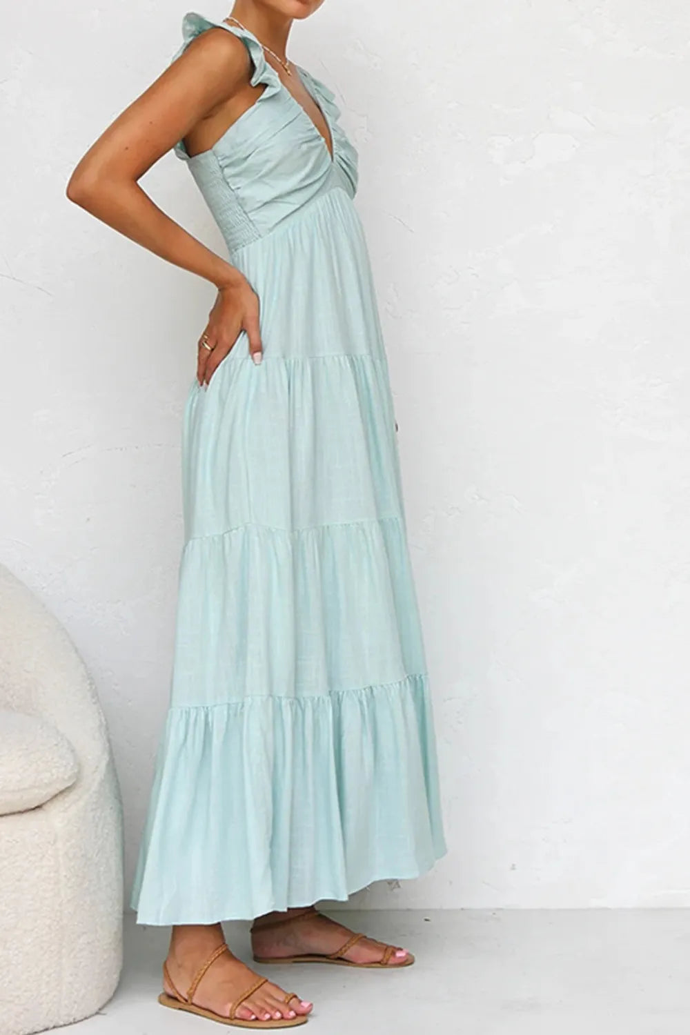 Women's 100% cotton ruffled v-neck tiered midi dress with floral pattern, stylish and comfortable for casual wear.