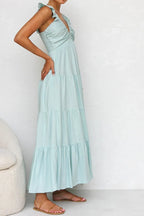 Women's 100% cotton ruffled v-neck tiered midi dress with floral pattern, stylish and comfortable for casual wear.