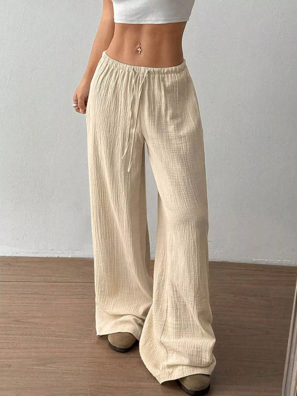 Plush Fashion Hub wide-leg drawstring plush pants with relaxed fit and soft fabric, shown in a full-length view.