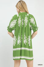 Women's two-tone border print flowy mini dress with casual summer boho style, featuring a relaxed fit and vibrant design.