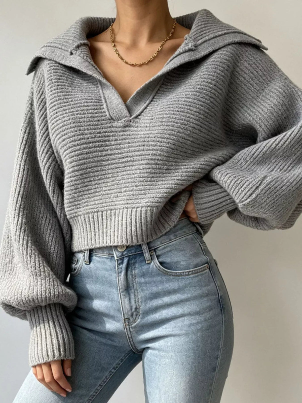 Trendsi women's ribbed cropped sweater with oversized collar, soft knit fabric and stylish fit, shown on a model.