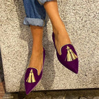 Women's suede pointed toe tassel flats by Plush Fashion Hub featuring a shallow mouth and low heel for casual wear.