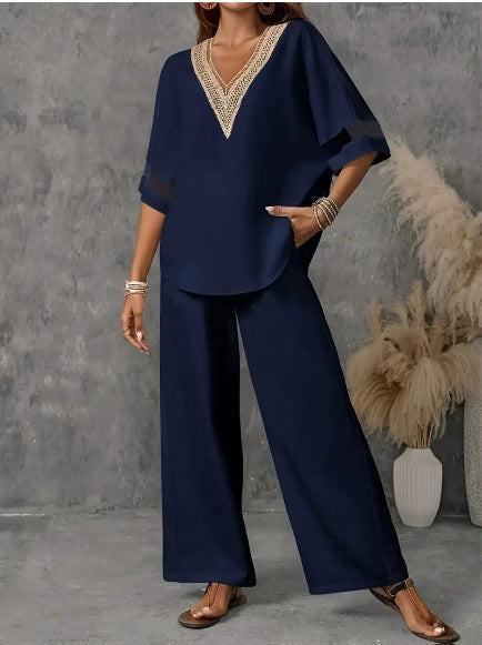 Women's embroidered V-neck top and wide-leg pants set by FitiqueFit, available in five colors, shown in a stylish two-piece outfit.