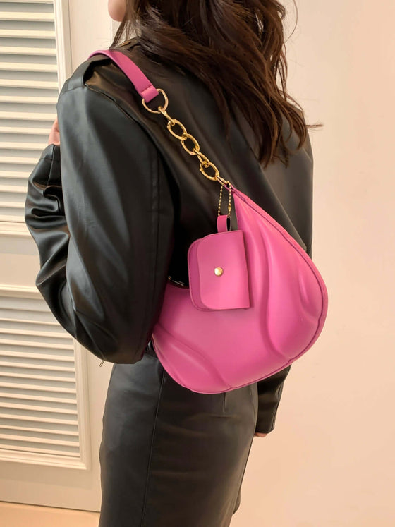 PU Leather Shoulder Bag in pink with bonus EarPods bag, stylish and spacious for everyday use.