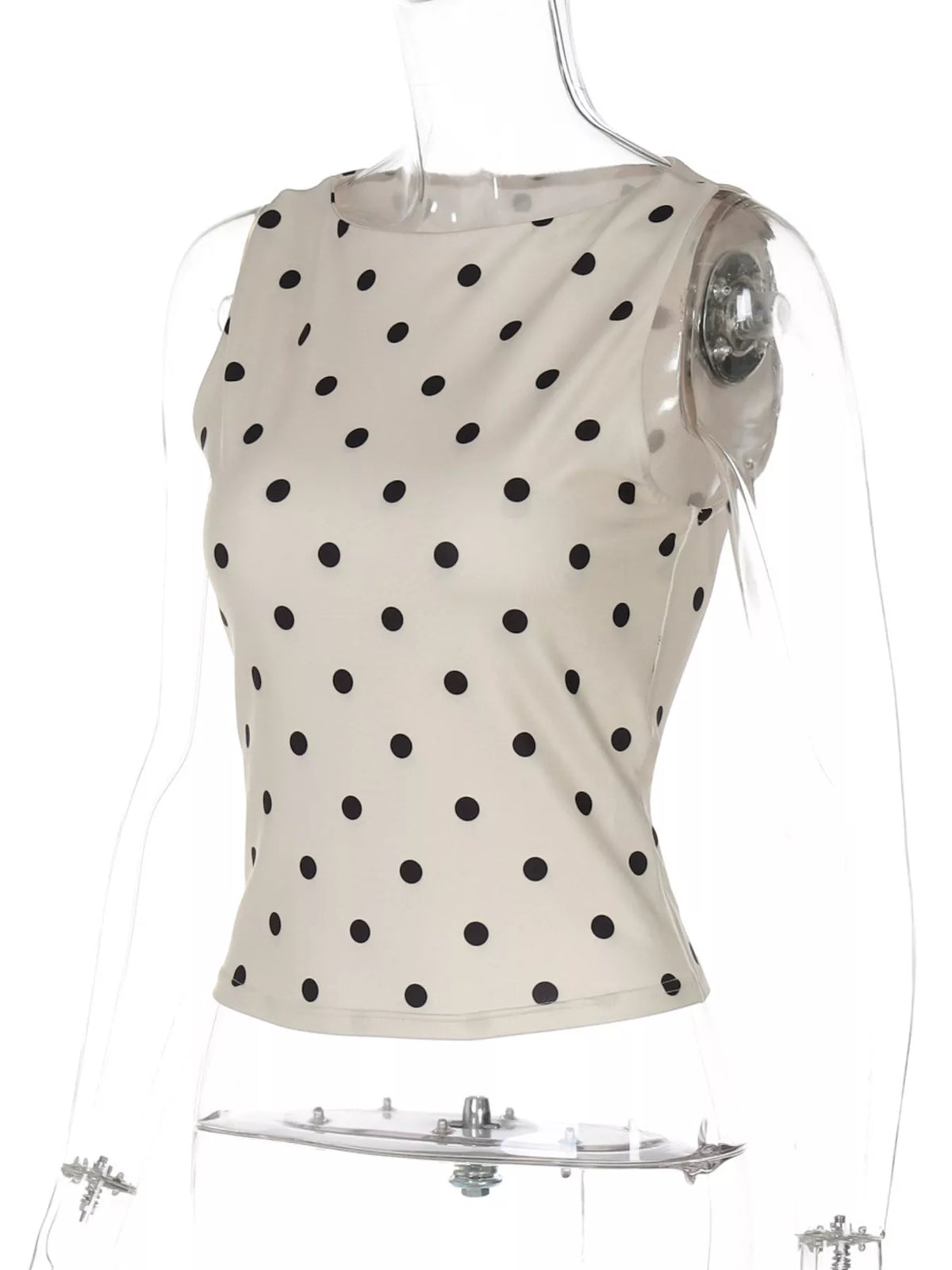 Plush Fashion Hub polka dot tank top featuring a sleeveless design with white dots on a vibrant background.