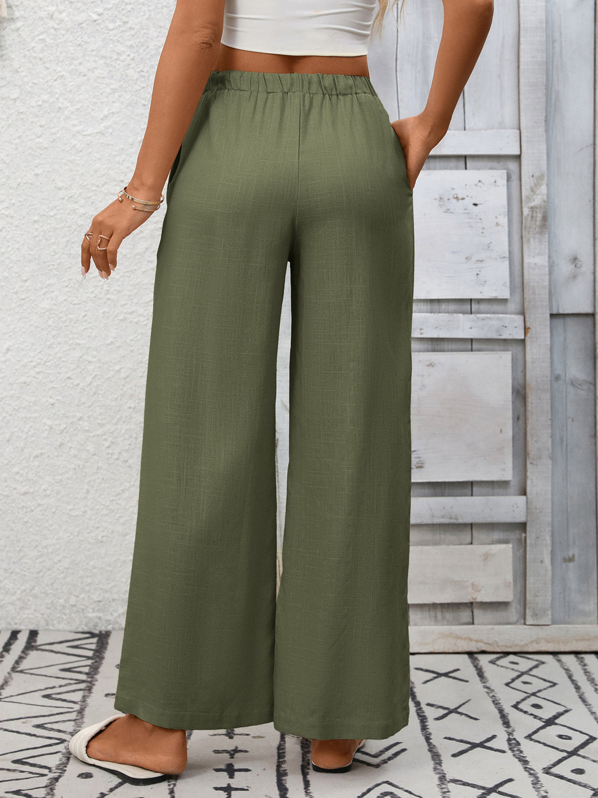 Women’s high-waisted wide-leg drawstring pants by Plush Fashion Hub, soft breathable viscose fabric, relaxed fit and comfortable style.