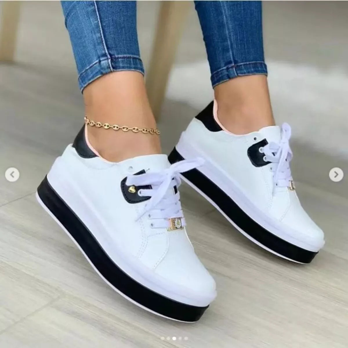 Lace-up platform sneakers from Trendsi featuring a trendy design, chunky sole, and stylish footwear for casual wear.