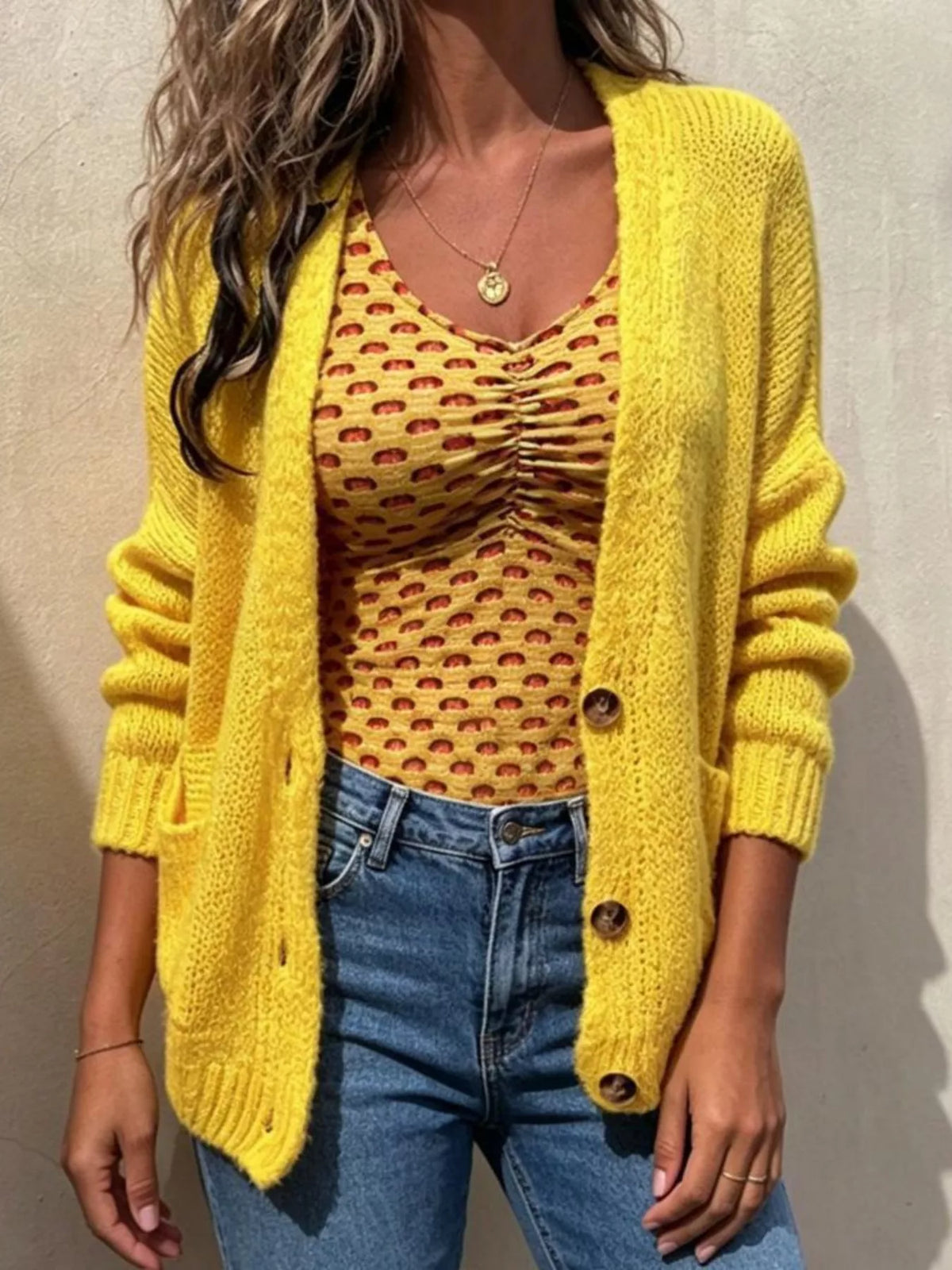 Plus size chunky knit button-up cardigan by Trendsi, shown in a full size, featuring a cozy, textured knit fabric and button closure.
