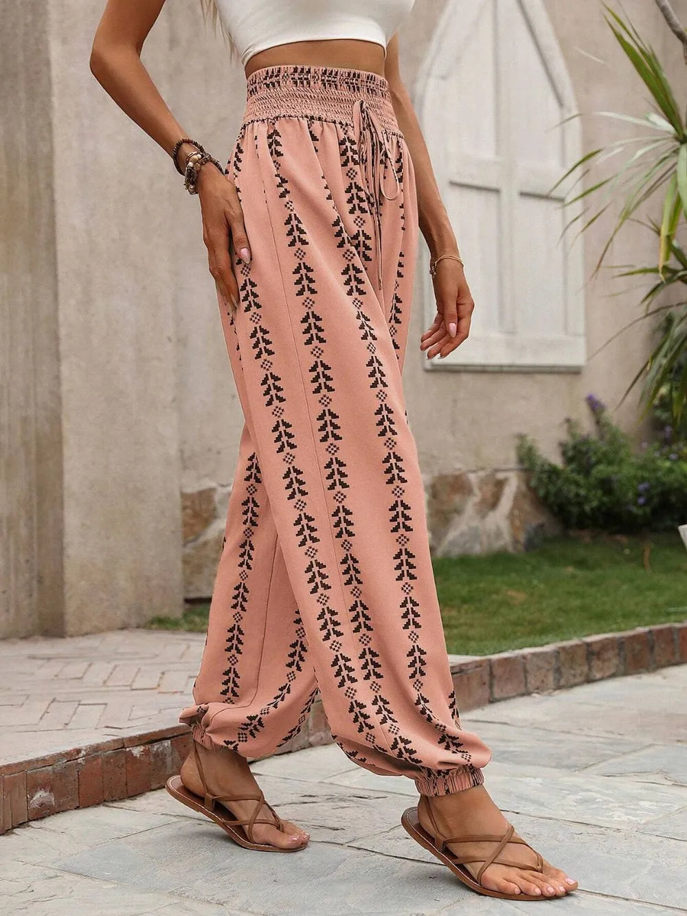 Plush Fashion Hub high-waisted printed pants with a relaxed fit, featuring colorful patterns and a comfortable fabric.