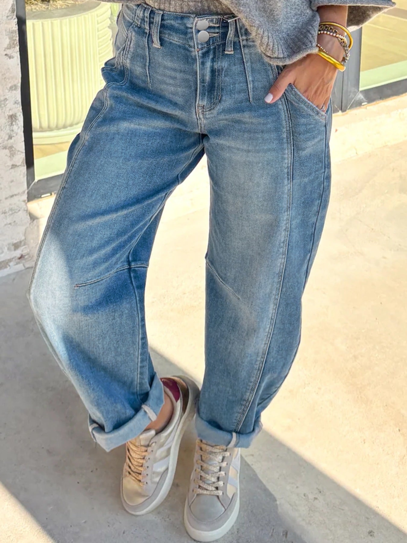 Washed cuffed barrel leg jeans with vintage relaxed fit, denim bottoms from Trendsi featuring distressed details and rolled cuffs.
