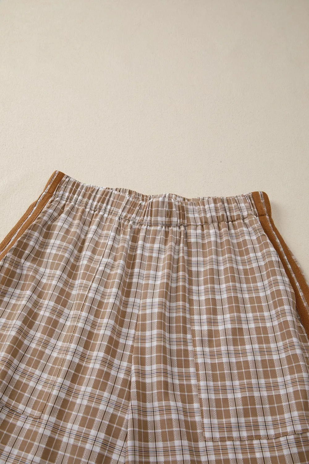 Casual plaid print pants with tie detail from Trendsi, featuring a relaxed fit and stylish design for everyday wear.
