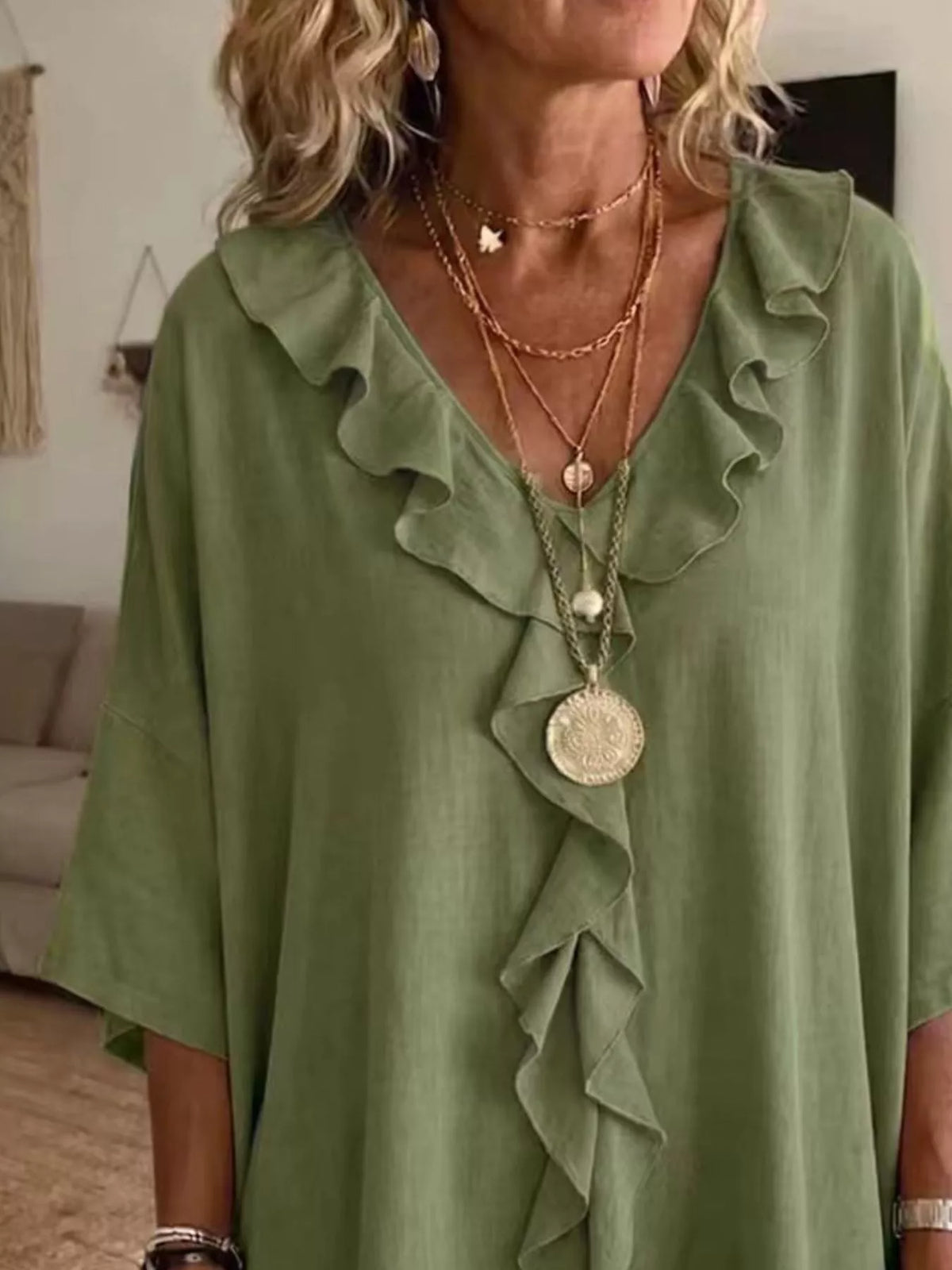 Plus size full ruffle V-neck blouse with 3/4 sleeves from Plush Fashion Hub, shown in a flattering fit with ruffle details and a V-neck.