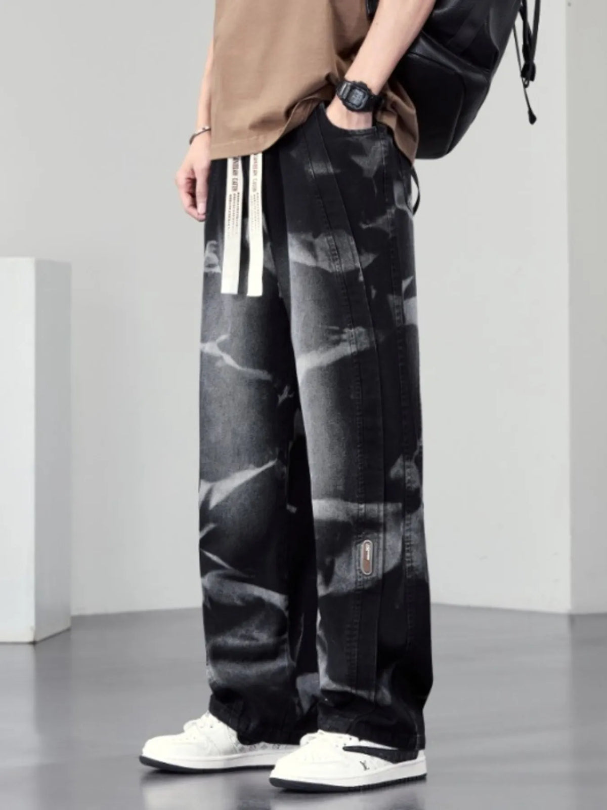Men's plus size washed wide-leg jeans from Plush Fashion Hub, showing the relaxed fit and stylish washed denim fabric.
