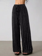 Striped wide-leg drawstring pants from Trendsi with a relaxed fit, featuring bold horizontal stripes and a comfortable waist.
