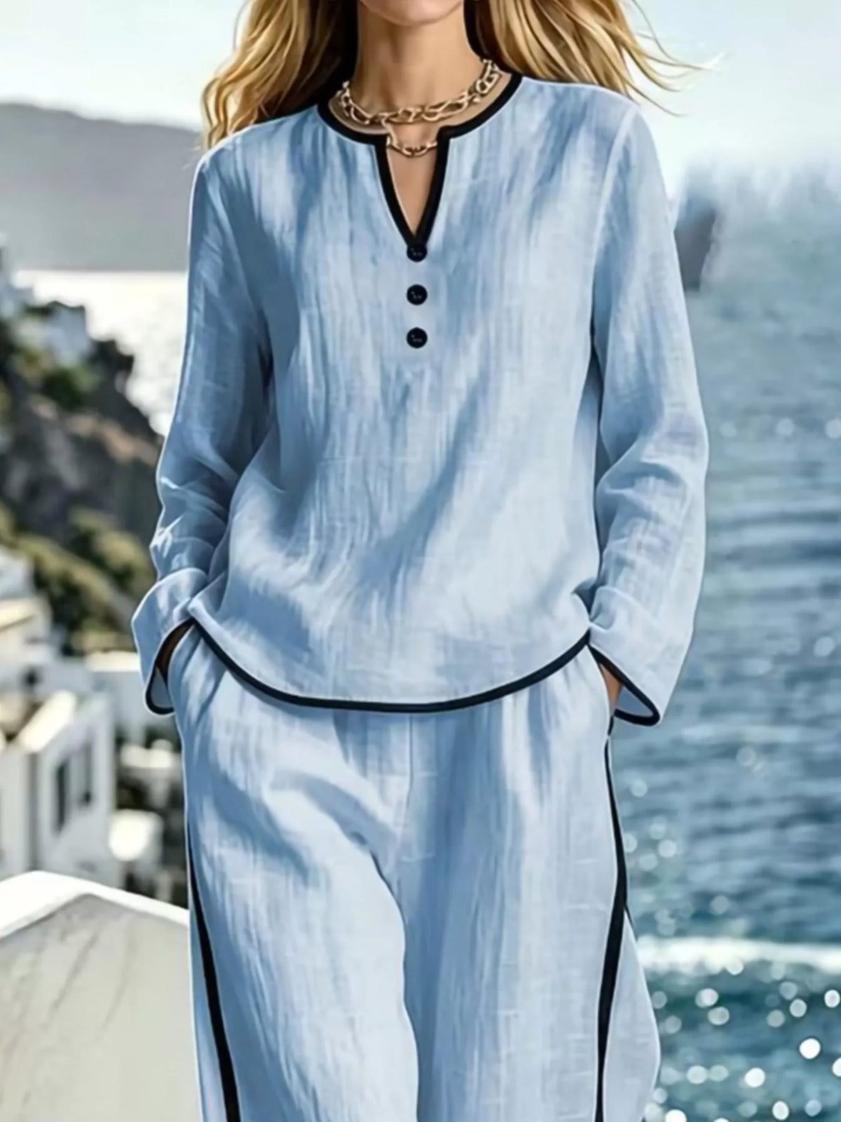 Contrast trim long sleeve top and pants set by Trendsi, featuring a stylish coordinated outfit with contrasting details.