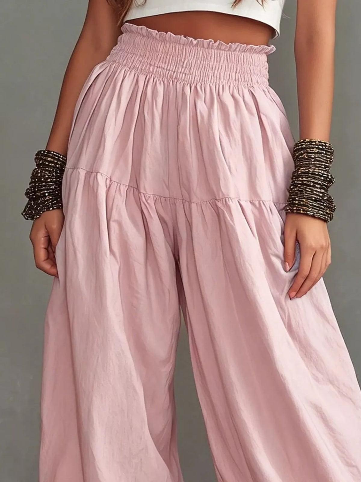Plus size full smocked ruffle hem wide-leg pants by Plush Fashion Hub, featuring flowy fabric and stylish ruffle details.