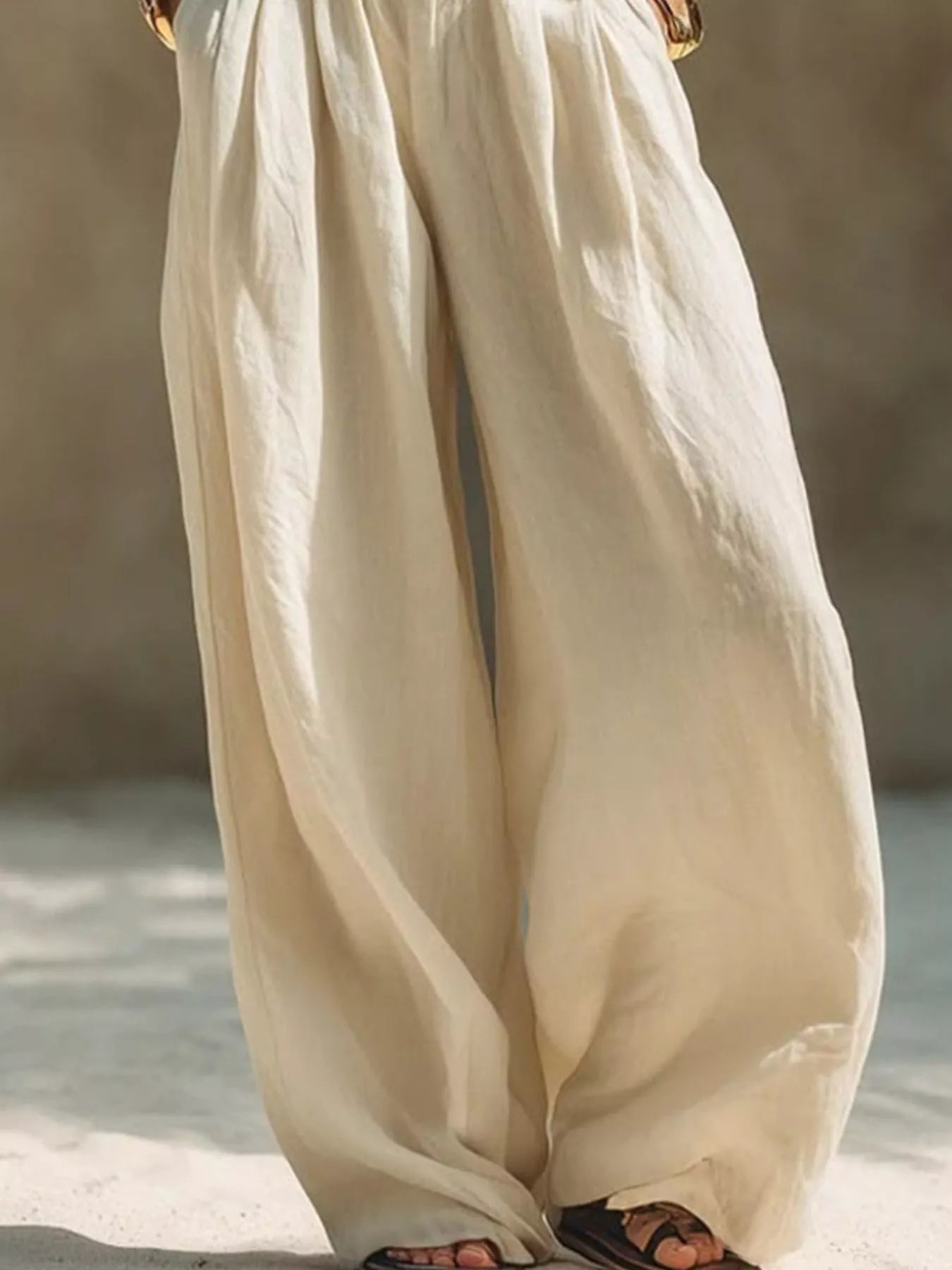 Plus size wide leg pants with full elastic waistband from Trendsi, showing the flowy, comfortable fit and relaxed style.