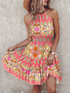 Paisley print halter neck mini dress from Plush Fashion Hub, featuring a stylish mini dress with a vibrant paisley pattern.