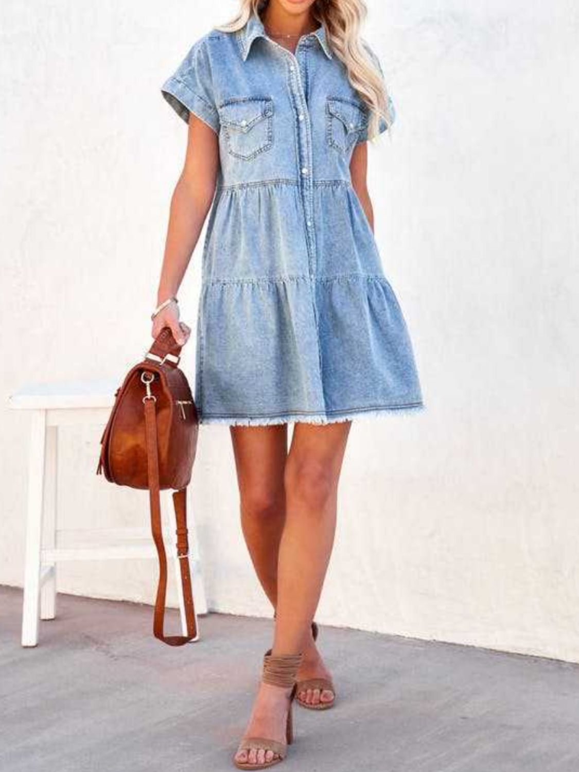 Raw hem short sleeve denim dress by Plush Fashion Hub, showing a casual blue denim dress with a raw hem and short sleeves.