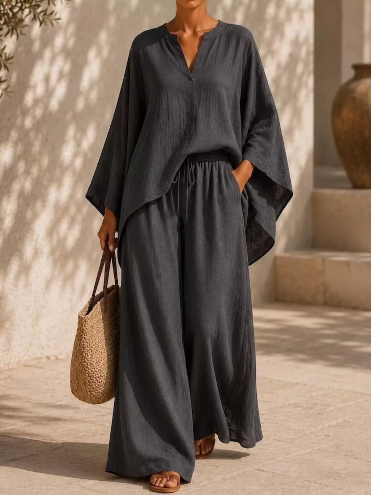 Plus size full notched long sleeve top and wide-leg pants loungewear set by Plush Fashion Hub, comfortable and stylish lounge outfit.