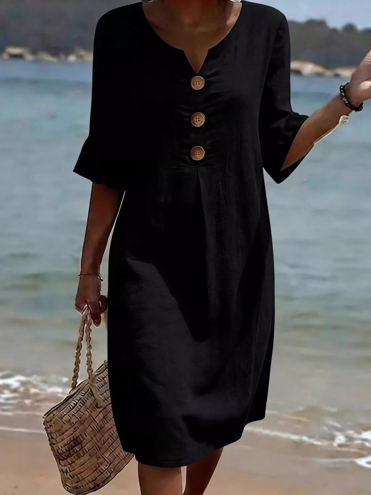 Plus size ruffle sleeve midi dress with button details from Plush Fashion Hub, featuring a flowy silhouette and stylish design.