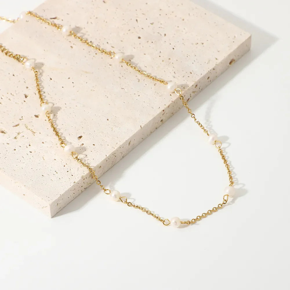18K gold-plated freshwater pearl necklace featuring a delicate strand of lustrous pearls and a subtle clasp, elegant jewelry for special occasions.